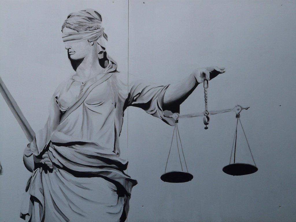 Lady Justice statue holding the scales of justice